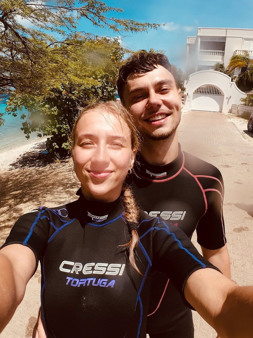 Ashley Kakiay and Sebastiaan van Teeffelen in wetsuits on holiday in Bonaire